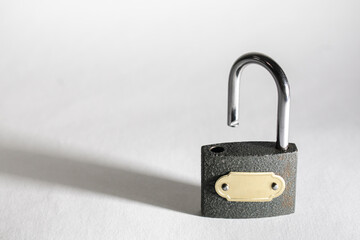 Naklejka premium padlock and key on a white background