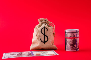 Close-up view of moneybag management deposit credit rate expenses spend budget bunch of dollars borrow bank service isolated over bright vivid shine vibrant red color background