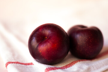 plums in light background