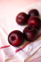 plums in light background