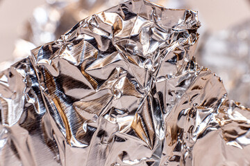 Close-up macro photography image of wrinkles on aluminum foil