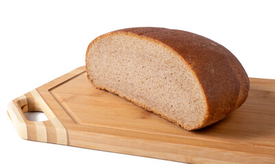 Half a loaf of rye bread lies on a wooden board. Isolated on a white background.