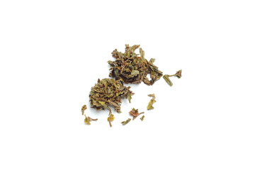 Loose black tea leaves used after brewing tea with it, isolated, white background