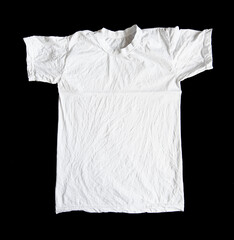 White crumpled t-shirt isolated on black background. Wrinkled shirt, top view. 