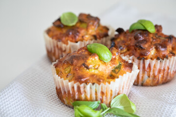 Fresh baked savory muffin. With herb spread and sprinkled with basil. healthy muffin. fresh baked food
