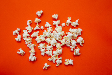 popcorn on orange color background