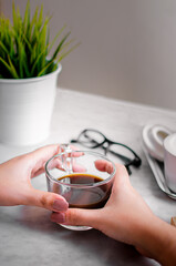 woman reading a book in a cafe