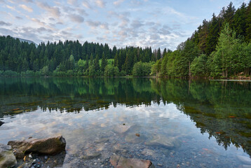 Fototapeta premium Beautiful landscape photo of Karagol / Karagöl Lake, surrounded by trees, Savsat / Şavşat, Artvin, Black Sea region of Turkey 