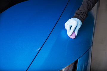 Car panel decontamination using clay bar