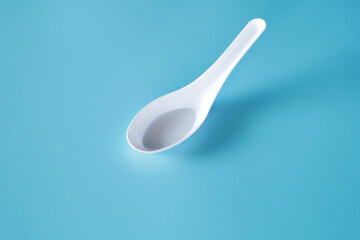 plastic spoon for background.
