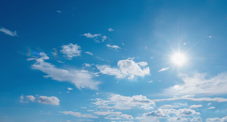 Naklejka na ściany i meble sun with white cloud and blue sky nature background
