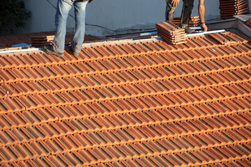repairing the roof of a home