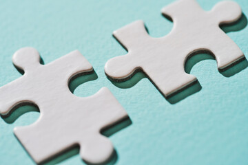 Two connecting puzzle piece.