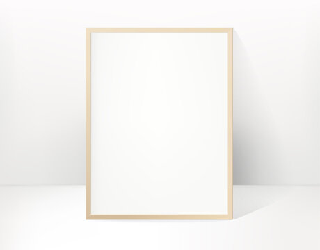 Wood picture or photo frame in bright interior. Template for design
