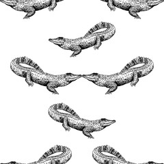 Seamless pattern of hand drawn sketch style crocodiles isolated on white background. Vector illustration.