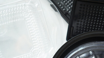 Black and white Plastic food containers on white background