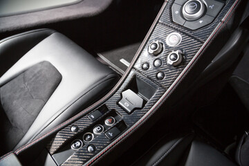 Naklejka premium Carbon fiber trim in sports car interior