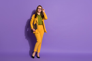 Full length photo of confident smart leader boss girl company assistant hold laptop ready start-up development meeting wear pants jacket isolated over purple color background