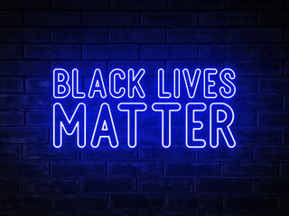 Black lives matter - blue neon light word on brick wall background