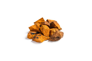 chaga mushroom. a pile of large pieces natural wild birch fungus chaga isolated on white background