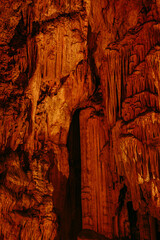 Fototapeta na wymiar Stalagmite and stalactites, Inside the Melidoni cave. Crete. Greece