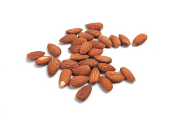 A pile of almonds on a white background