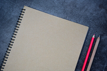 Pencils and notebooks on the desk