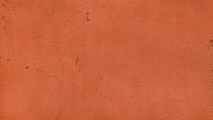 Orange painted wall texture with copy space. abstract stucco wall background.