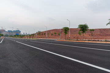 Fototapeta premium Perspective landscape of asphalt pavement in new city streets