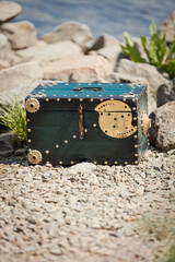 Marine decorations. Scene on sea beach. Treasure chest