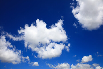 Naklejka na ściany i meble White cloud again blue sky on sunny day