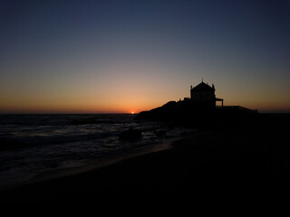 Obraz premium Silhouette of Senhor da Pedra Chapel in Oporto, Portugal