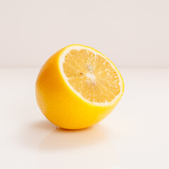 Fresh cut lemon on a white background