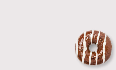 Glazed chocolate donut on a white background