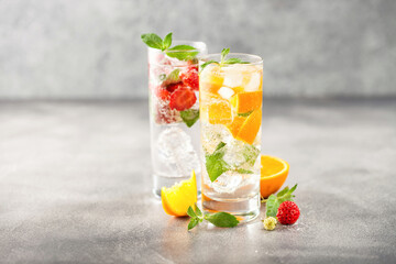 Summer drinks with strawberry and orange