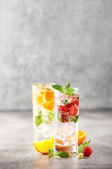 Summer drinks with strawberry and orange