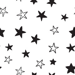 Star doodles seamless pattern. Hand drawn stars background texture.
