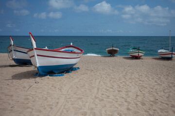 Boats on the beach. Walking on the sea. Rest.
