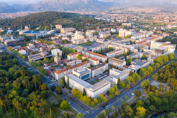 Podgorica, capital of Montenegro: panoramic aerial view. The city is renowned for its green parks. This small country is located on the Balkans peninsula on the Mediterranean, in South Eastern Europe.