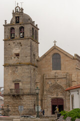 Fototapeta na wymiar Vasco da Gama Square, Vila do Conde’s Matrice Church (Mother Church, Igreja Matriz), dedicated to St. John the Baptist in Vila do Conde, Portugal.