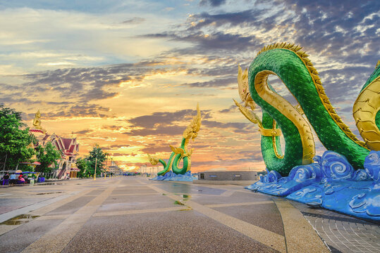 Nong Khai, Thailand Riverside Mekong and important landmarks of Nong Khai in the evening. Naga City Nong Khai symbol
