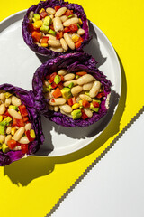 homemade bean salad with carrots, avocado, pepper