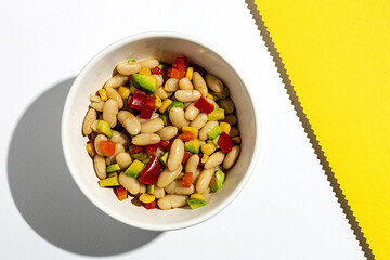 homemade bean salad with carrots, avocado, pepper
