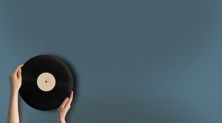young woman with vinyl record