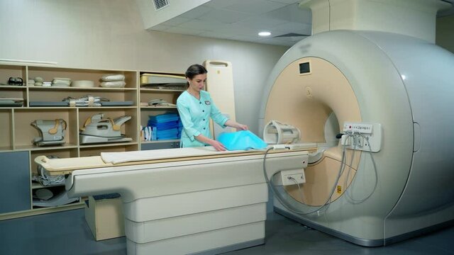 MRI machine device in hospital. Magnetic resonance imaging scan device in hospital