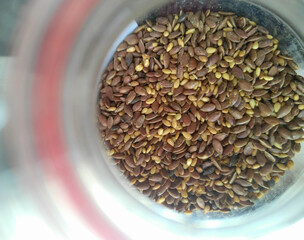 sunflower seeds in a wooden bowl, flaxseeds photography, healthy eating snacks food ingredients background