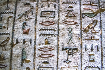 Burial chamber with colorful Egyptian hieroglyphics at the valley of the kings, Luxor, Egypt