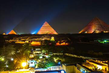 Great Pyramid of Giza illuminated at night, UNESCO World Heritage site, Cairo, Egypt.