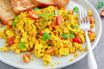 Tofu Scramble with Toasted bread, Vegan Food, Vegan Breakfast, Dark Background, Healthy Food Photography

