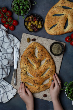 Fugasse bread with sesame seeds and herbs